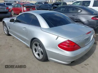 2004 Mercedes-Benz SL 500 with VIN WDBSK75F44F071115, listed as a IAAI auction lot 42565805 with 80,201 mi miles and . Bid and sale history available at DreamBid. Image 3.