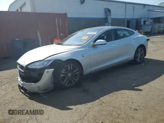 2013 Tesla Model S with VIN 5YJSA1CG9DFP06427, listed as a Copart auction lot 59515845 with 49,446 mi miles and Salvage title. Bid and sale history available at DreamBid. Image 1.