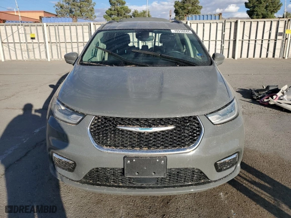 2021 Chrysler Pacifica Hybrid Touring L with VIN 2C4RC1L73MR581213, listed as a Copart auction lot 78910244 with 104,426 mi miles and Salvage Title. Bid and sale history available at carsss.com. Image 5.