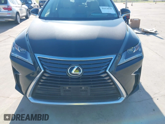 2016 Lexus RX 350 with VIN 2T2ZZMCA9GC012233, listed as a IAAI auction lot 41974549 with 84,960 mi miles and . Bid and sale history available at DreamBid. Image 12.