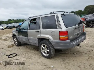 1998 Jeep Grand Cherokee Laredo with VIN 1J4FX58S7WC350624, listed as a Copart auction lot 63063624 with 0 mi miles and Salvage Title. Bid and sale history available at carsss.com. Image 2.