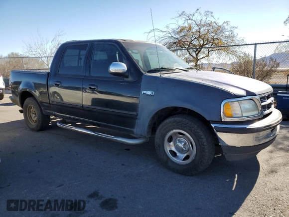 2002 Ford F-150 XLT with VIN 1FTRW07682KB94008, listed as a Copart auction lot 88724185 with 231,464 mi miles and Salvage Title. Bid and sale history available at carsss.com. Image 4.