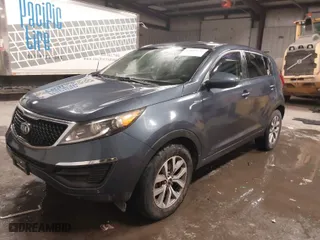 2014 Kia Sportage LX with VIN KNDPBCAC5E7619193, listed as a IAAI auction lot 41599236 with 124736 miles. Bid and sale history available at carsss.com. Image 2.