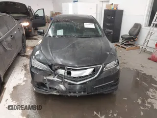 2015 Acura TLX Technology z VIN 19UUB1F51FA002302, wystawiony jako IAAI lot #41450716 z przebiegiem 124 498 mil mil oraz . Historia ofert i sprzedaży dostępna na DreamBid. Obrazek 12.