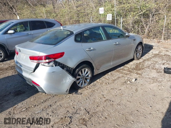 2016 Kia Optima LX with VIN 5XXGT4L35GG059931, listed as a IAAI auction lot 40995180 with 130,596 mi miles. Bid and sale history available at carsss.com. Image 4.