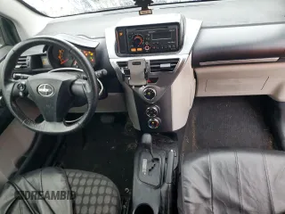 2013 Scion iQ with VIN JTNJJXB08DJ025554, listed as a Copart auction lot 88923885 with 110,378 mi miles and Salvage title. Bid and sale history available at DreamBid. Image 8.