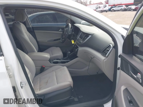 2017 Hyundai Tucson SE with VIN KM8J3CA48HU556569, listed as a IAAI auction lot 41378853 with 67,832 mi miles. Bid and sale history available at carsss.com. Image 5.