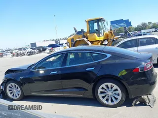 2016 Tesla Model S 70 with VIN 5YJSA1E1XGF148732, listed as a IAAI auction lot 42654257 with Not provided miles and . Bid and sale history available at DreamBid. Image 13.