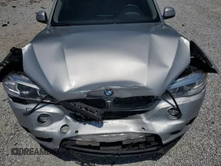 2015 BMW X5 xDrive35i z VIN 5UXKR0C52F0P12247, wystawiony jako Copart lot #54955465 z przebiegiem 87 315 mil mil oraz Szkoda całkowita • Salvage title. Historia ofert i sprzedaży dostępna na DreamBid. Obrazek 12.