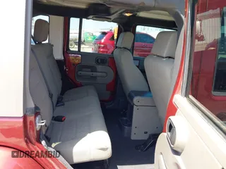 2008 Jeep Wrangler Unlimited Sahara with VIN 1J4GA59108L594193, listed as a IAAI auction lot 42272239 with 161,912 mi miles and . Bid and sale history available at DreamBid. Image 8.
