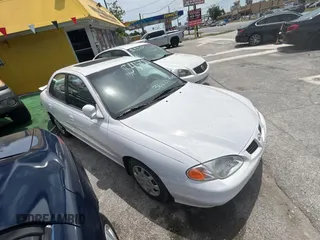 2000 Hyundai Elantra GLS z VIN KMHJF35F2YU031316, wystawiony jako Copart lot #54419725 z przebiegiem 36 437 mil mil oraz Czysty tytuł • Clean title. Historia ofert i sprzedaży dostępna na DreamBid. Obrazek 1.