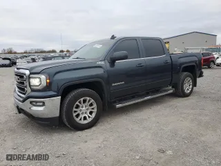 2018 GMC Sierra 1500 SLE with VIN 3GTU2MEC8JG252761, listed as a Copart auction lot 82027414 with 106,885 mi miles and Salvage Title. Bid and sale history available at carsss.com. Image 1.