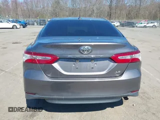 2019 Toyota Camry LE z VIN 4T1B11HK9KU245615, wystawiony jako IAAI lot #42066968 z przebiegiem 130 042 mil mil oraz . Historia ofert i sprzedaży dostępna na DreamBid. Obrazek 17.
