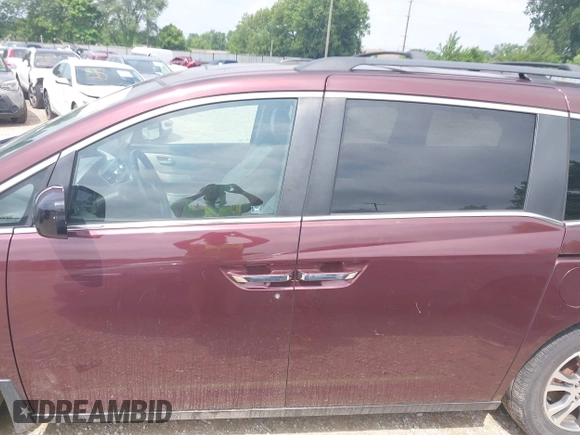 2011 Honda Odyssey EX-L with VIN 5FNRL5H6XBB096891, listed as a IAAI auction lot 42840531 with 214,842 mi miles and . Bid and sale history available at DreamBid. Image 15.