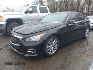 2015 Infiniti Q50 Premium with VIN JN1BV7AP9FM349709, listed as a IAAI auction lot 41976089 with 62,094 mi miles and . Bid and sale history available at DreamBid. Image 17.