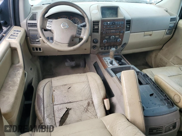 2011 Nissan Titan Pro-4X with VIN 1N6BA0ECXBN302004, listed as a Copart auction lot 89343945 with 427,682 mi miles and Salvage title. Bid and sale history available at DreamBid. Image 8.