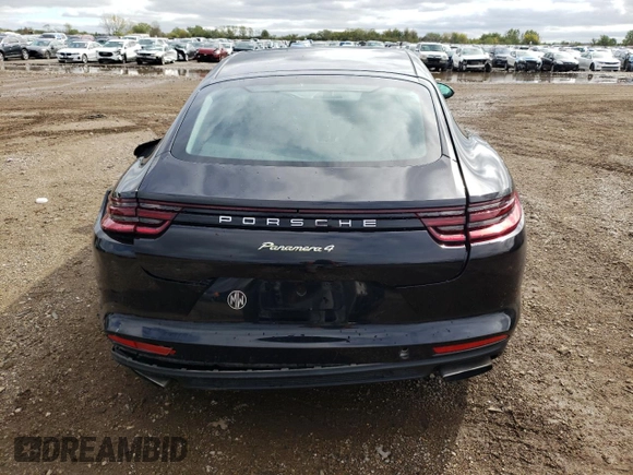 2018 Porsche Panamera 4 E-Hybrid z VIN WP0AE2A72JL127720, wystawiony jako Copart lot #71872404 z przebiegiem Nie podano mil oraz Szkoda całkowita • Salvage title. Historia ofert i sprzedaży dostępna na DreamBid. Obrazek 6.