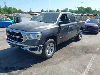 2021 Ram 1500 Big Horn with VIN 1C6SRFFT7MN620668, listed as a IAAI auction lot 42183592 with 74,829 mi miles and . Bid and sale history available at DreamBid. Image 2.