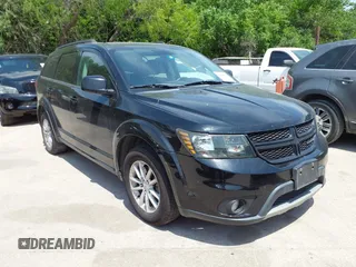 2015 Dodge Journey SXT with VIN 3C4PDCBG2FT718451, listed as a IAAI auction lot 42039821 with 198,695 mi miles and . Bid and sale history available at DreamBid. Image 1.