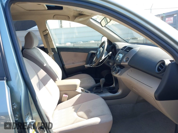 2006 Toyota RAV4 with VIN JTMZD33V465012121, listed as a IAAI auction lot 42013354 with 214,726 mi miles. Bid and sale history available at carsss.com. Image 5.