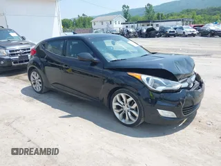 2013 Hyundai Veloster w/Red Int с VIN KMHTC6AD2DU145365, выставлен на аукционе IAAI как лот 42419376 с пробегом 103 453 миль миль и . История ставок и продаж доступна на DreamBid. Изображение 1.