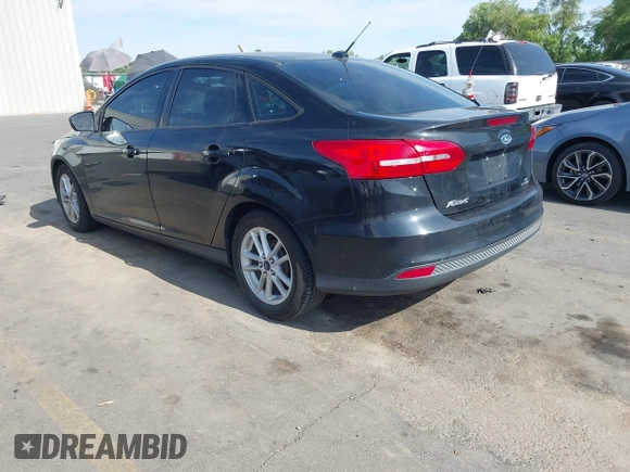2015 Ford Focus SE with VIN 1FADP3F22FL202570, listed as a IAAI auction lot 42426863 with 131,833 mi miles and . Bid and sale history available at DreamBid. Image 3.