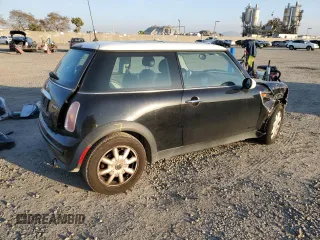 2004 MINI Hardtop with VIN WMWRC33484TJ59008, listed as a Copart auction lot 46003105 with 83,303 mi miles and Salvage Title. Bid and sale history available at DreamBid. Image 3.
