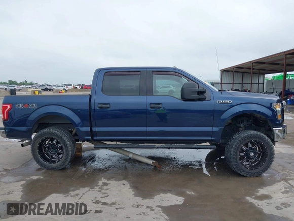 2016 Ford F-150 XLT with VIN 1FTEW1EF4GKE97477, listed as a IAAI auction lot 42177030 with 119,272 mi miles and . Bid and sale history available at DreamBid. Image 14.