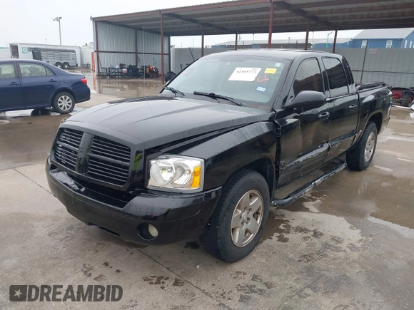 2005 Dodge Dakota SLT z VIN 1D7HE48N05S304121, wystawiony jako IAAI lot #42165773 z przebiegiem 192 886 mil mil oraz . Historia ofert i sprzedaży dostępna na DreamBid. Obrazek 17.