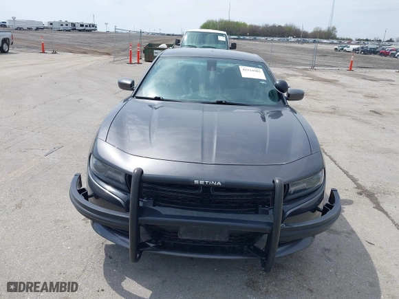 2020 Dodge Charger Police with VIN 2C3CDXKT3LH112023, listed as a IAAI auction lot 42124903 with 130,738 mi miles. Bid and sale history available at carsss.com. Image 12.