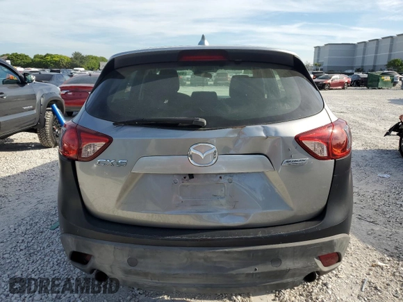 2015 Mazda CX-5 Sport with VIN JM3KE2BE2F0445810, listed as a Copart auction lot 65672555 with 218,675 mi miles and Clean title. Bid and sale history available at DreamBid. Image 6.