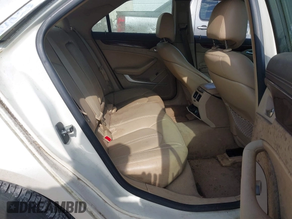 2009 Cadillac CTS RWD with VIN 1G6DF577690108865, listed as a IAAI auction lot 42314121 with 153,702 mi miles and . Bid and sale history available at DreamBid. Image 8.