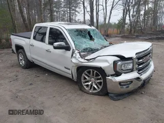 2017 GMC Sierra 1500 SLT z VIN 3GTU2NECXHG496153, wystawiony jako IAAI lot #41787068 z przebiegiem 115 091 mil mil oraz . Historia ofert i sprzedaży dostępna na DreamBid. Obrazek 1.