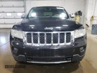 2013 Jeep Grand Cherokee Overland with VIN 1C4RJFCG7DC646348, listed as a Copart auction lot 49526415 with 137,889 mi miles and Clean Title. Bid and sale history available at carsss.com. Image 5.