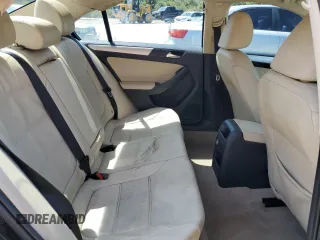 2012 Volkswagen Jetta TDI w/Premium z VIN 3VWLL7AJ3CM036834, wystawiony jako Copart lot #51161225 z przebiegiem 181 109 mil mil oraz Szkoda całkowita • Salvage title. Historia ofert i sprzedaży dostępna na DreamBid. Obrazek 10.