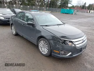 2010 Ford Fusion Hybrid z VIN 3FADP0L38AR306521, wystawiony jako IAAI lot #41787841 z przebiegiem 190 494 mil mil oraz . Historia ofert i sprzedaży dostępna na DreamBid. Obrazek 1.