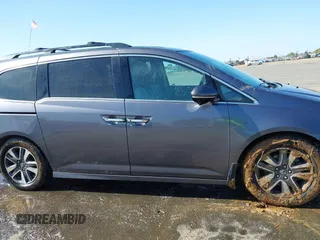 2015 Honda Odyssey Touring Elite с VIN 5FNRL5H93FB056183, выставлен на аукционе IAAI как лот 42073205 с пробегом 119 874 миль миль и . История ставок и продаж доступна на DreamBid. Изображение 14.