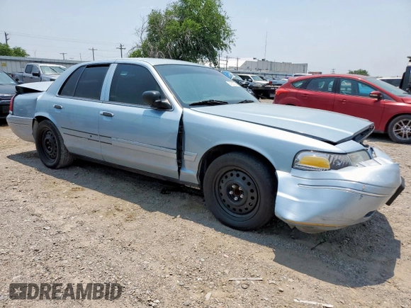 2004 Ford Crown Victoria LX z VIN 2FAFP74W54X184815, wystawiony jako Copart lot #57280725 z przebiegiem 294 513 mil mil oraz Szkoda całkowita • Salvage title. Historia ofert i sprzedaży dostępna na DreamBid. Obrazek 4.
