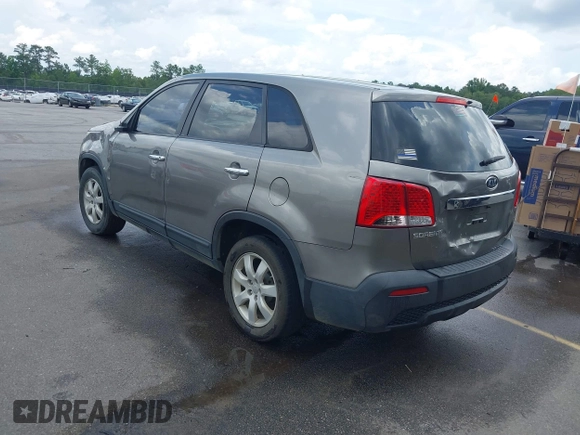 2013 Kia Sorento LX with VIN 5XYKT3A1XDG381218, listed as a IAAI auction lot 42511747 with 130,253 mi miles and . Bid and sale history available at DreamBid. Image 3.