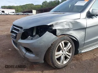 2015 Mercedes-Benz M 350 with VIN 4JGDA5JB1FA452999, listed as a IAAI auction lot 41100935 with 52,636 mi miles and . Bid and sale history available at DreamBid. Image 6.