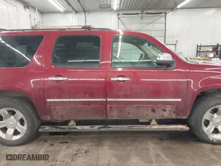 2009 Chevrolet Suburban LTZ with VIN 1GNFK36399J105044, listed as a IAAI auction lot 41628710 with 207,905 mi miles. Bid and sale history available at carsss.com. Image 14.