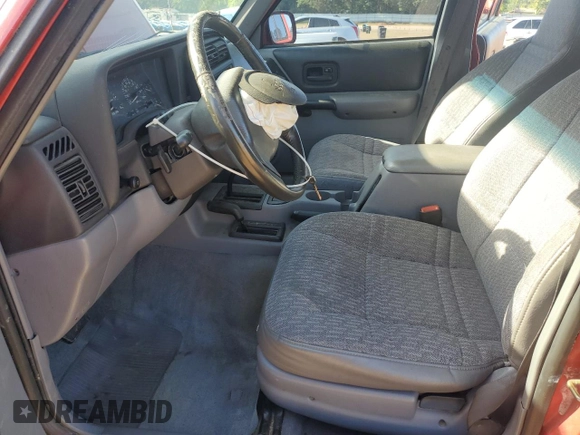 1998 Jeep Cherokee Sport with VIN 1J4FJ68S3WL167809, listed as a Copart auction lot 53829645 with Not provided miles and Salvage title. Bid and sale history available at DreamBid. Image 7.