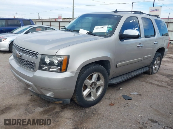 2008 Chevrolet Tahoe LTZ with VIN 1GNFC13JX8R277832, listed as a IAAI auction lot 41348121 with 210,576 mi miles and . Bid and sale history available at DreamBid. Image 2.