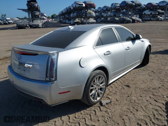 2011 Cadillac CTS Performance with VIN 1G6DJ5ED6B0128062, listed as a IAAI auction lot 42150038 with 245,293 mi miles and . Bid and sale history available at DreamBid. Image 4.