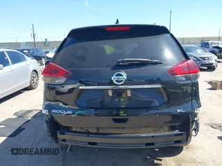 2019 Nissan Rogue SL with VIN 5N1AT2MTXKC813158, listed as a IAAI auction lot 41665354 with 62,605 mi miles and . Bid and sale history available at DreamBid. Image 17.