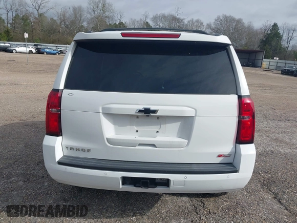2017 Chevrolet Tahoe LT with VIN 1GNSKBKCXHR350028, listed as a IAAI auction lot 41684954 with 117,261 mi miles and . Bid and sale history available at DreamBid. Image 17.