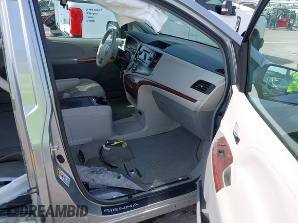 2014 Toyota Sienna XLE with VIN 5TDYK3DC0ES451307, listed as a IAAI auction lot 42093569 with 105,721 mi miles and . Bid and sale history available at DreamBid. Image 5.