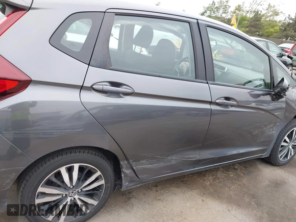2018 Honda Fit EX with VIN 3HGGK5H85JM704873, listed as a IAAI auction lot 42421049 with 58,481 mi miles and . Bid and sale history available at DreamBid. Image 6.