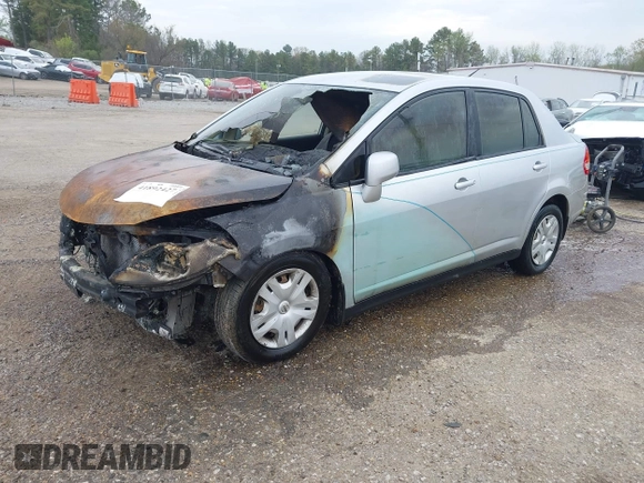 2011 Nissan Versa S with VIN 3N1BC1AP9BL381390, listed as a IAAI auction lot 41892427 with Not provided miles and . Bid and sale history available at DreamBid. Image 2.