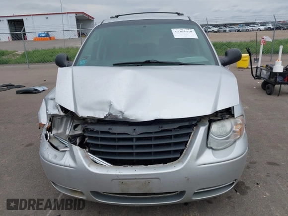 2006 Chrysler Town & Country Touring z VIN 2A4GP54L96R730719, wystawiony jako IAAI lot #42363419 z przebiegiem 186 173 mil mil oraz . Historia ofert i sprzedaży dostępna na DreamBid. Obrazek 12.